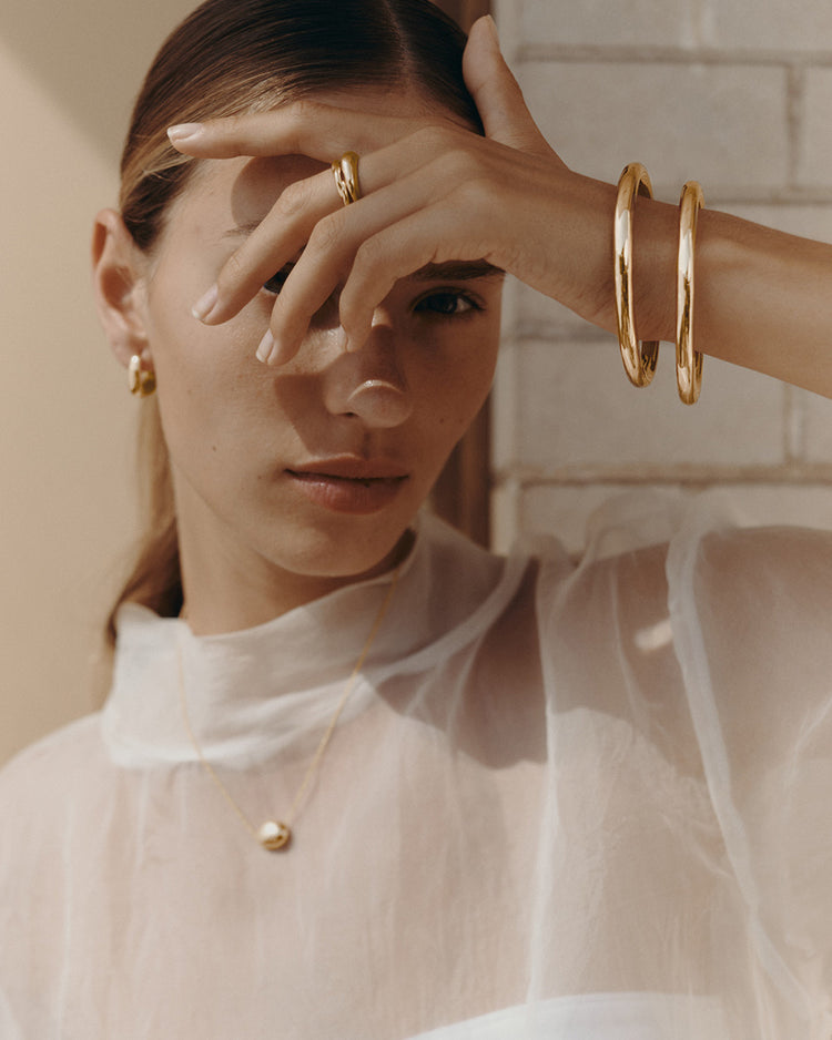 WITHIN MOTION TUBE BANGLE (18K GOLD PLATED)