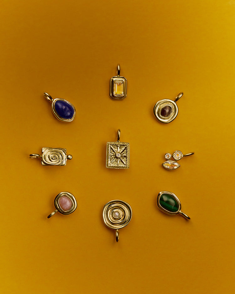 VOYAGER TIGERS EYE CHARM (9K GOLD)