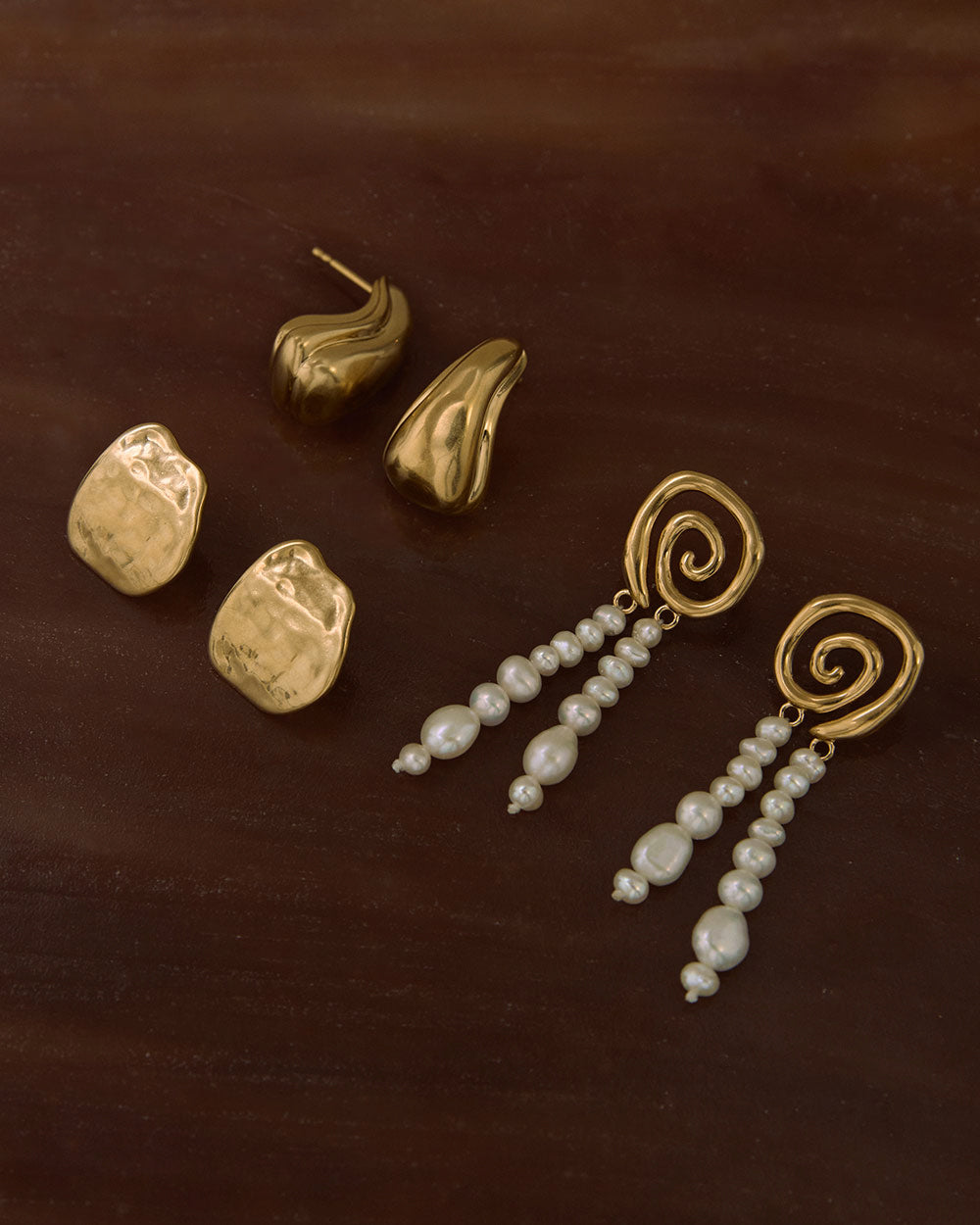 FLOAT OVERSIZED STUDS (18K GOLD PLATED)