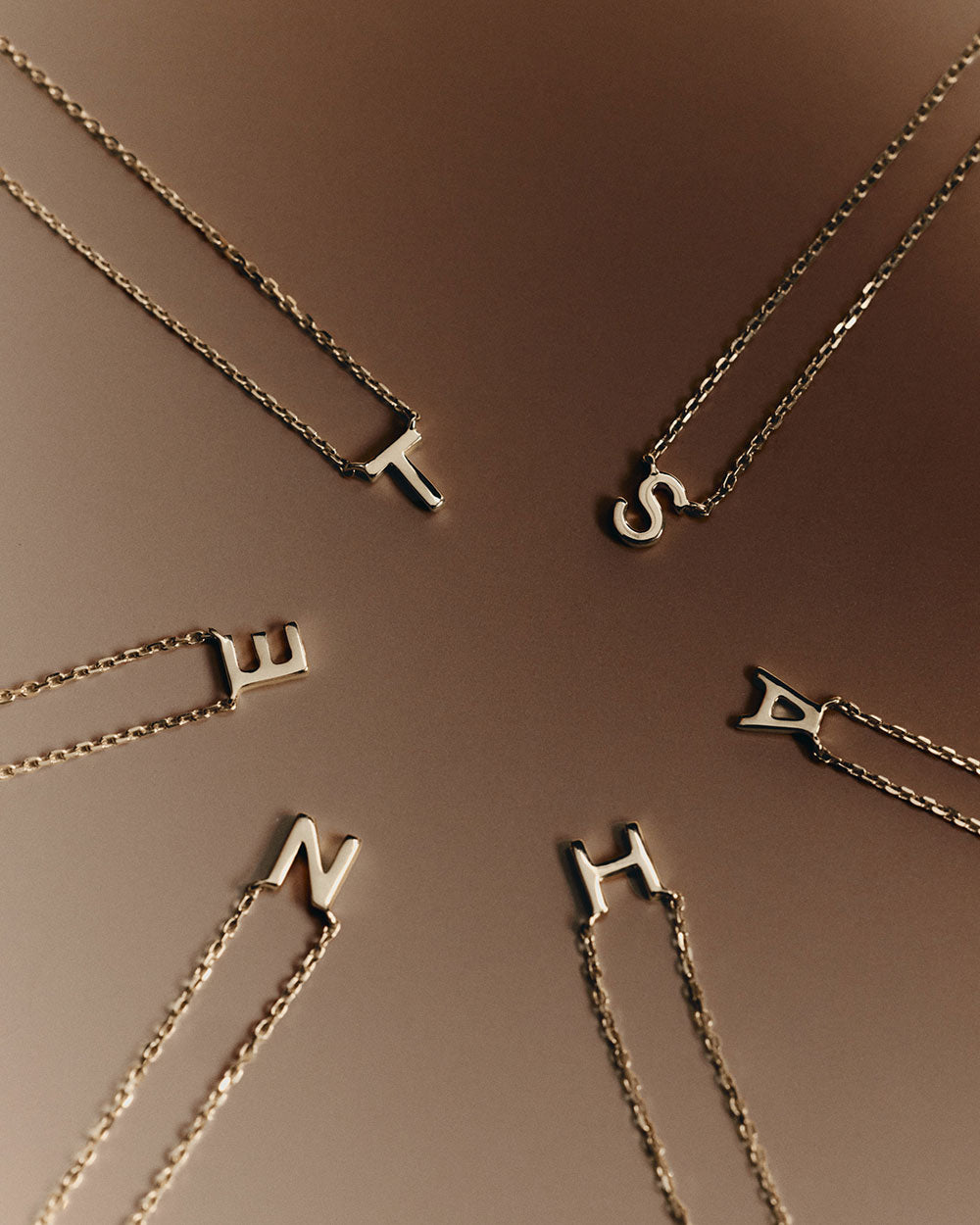 PETITE INITIAL NECKLACE (9K GOLD)